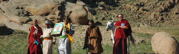 Mongolia’s Bogd Khan protected Area is associated with the life of Ghengis Khan and has been a national protected sacred natural site since 1778. It is now part of the extensive Khan Khentii Mountain Protected Area. After many years of communist suppression, ceremonies have been revived led my local Buddhist lamas. The ceremonies honour the deities of the mountains and petition against drought and heavy snow. Here the group that performs the ritual at the most sacred part of the mountain, the top, returns led by monks. Third person from the left is Mr. J. Boldbaatar, Director, Khan Khentii Special protected Area and on his right the first modern day park ranger (see case study in the IUCN UNESCO Guidelines). Photo: Robert Wild.